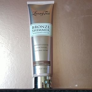 Brand new loving tan bronze shimmer in shade DARK